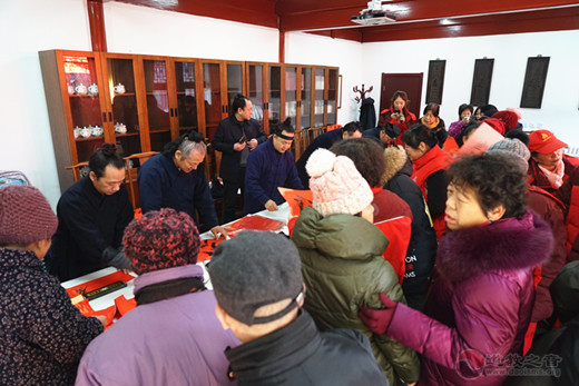 北京市西城区道教协会举办写春联送福活动