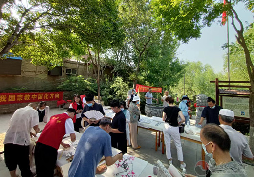 淄博市周村区民族宗教界庆七一颂党恩跟党走书画笔会在周村三星庙举行